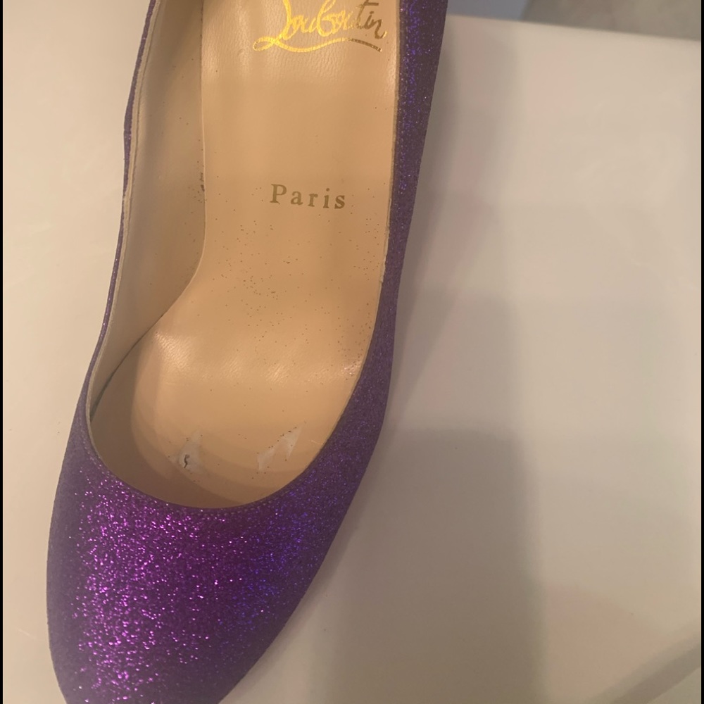 New with box Christian Louboutin purple pumps 7.5